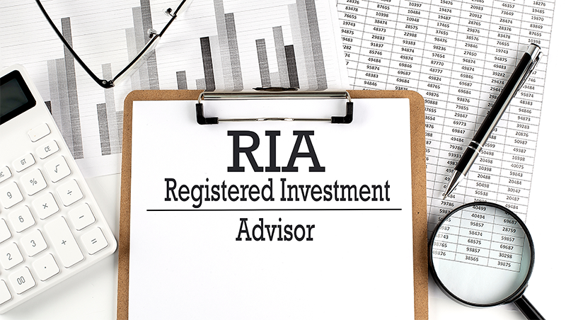 Clipboard and office supplies representing how to start an RIA from FocusPoint Solutions